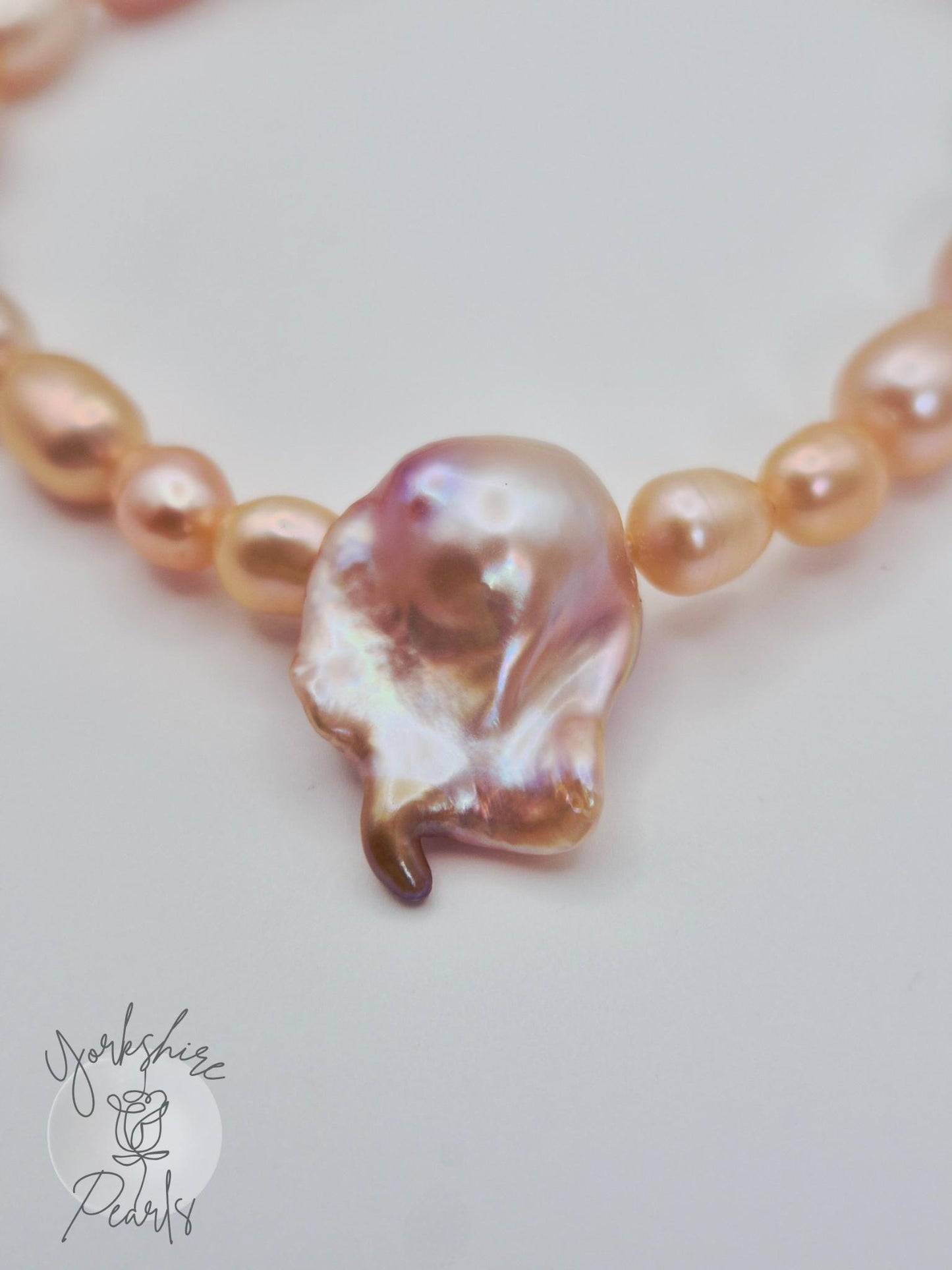 Multiple Pearl Bracelet With Centre Baroque Pearl