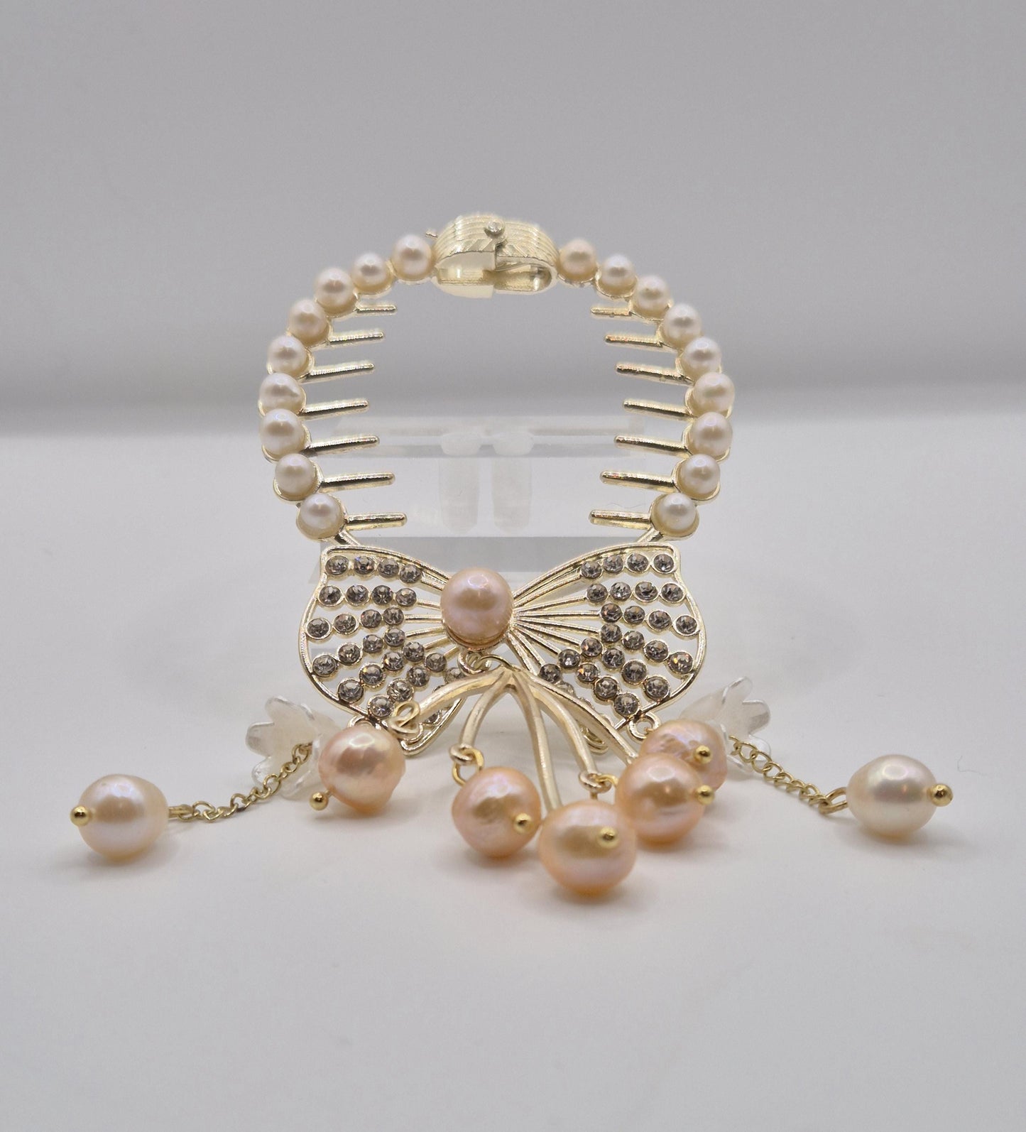 Gilded Bow Pearl Cascade Hair Comb