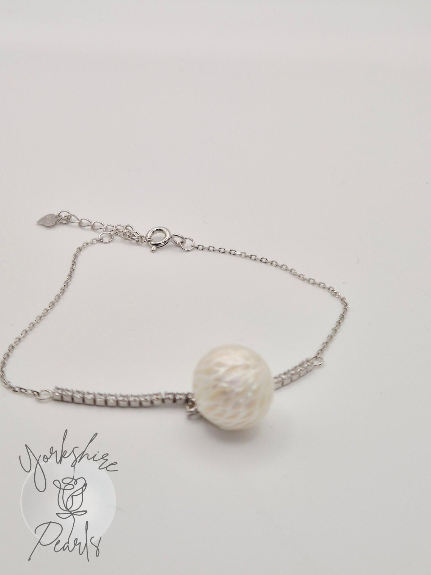 Carved Edison Pearl Silver Bracelet With CZ Stones