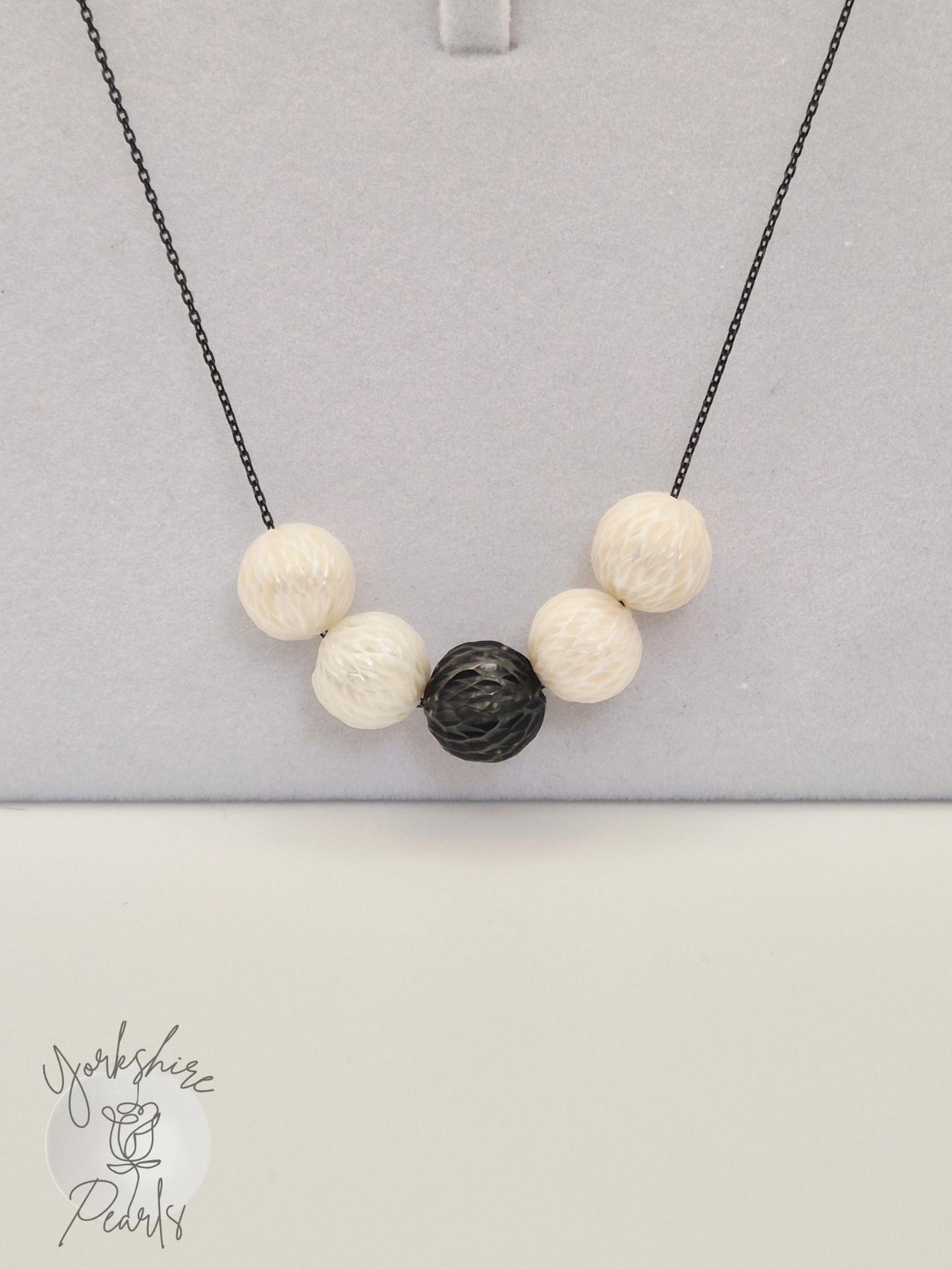 Black Tahitian and White Carved Pearl Smile Necklace