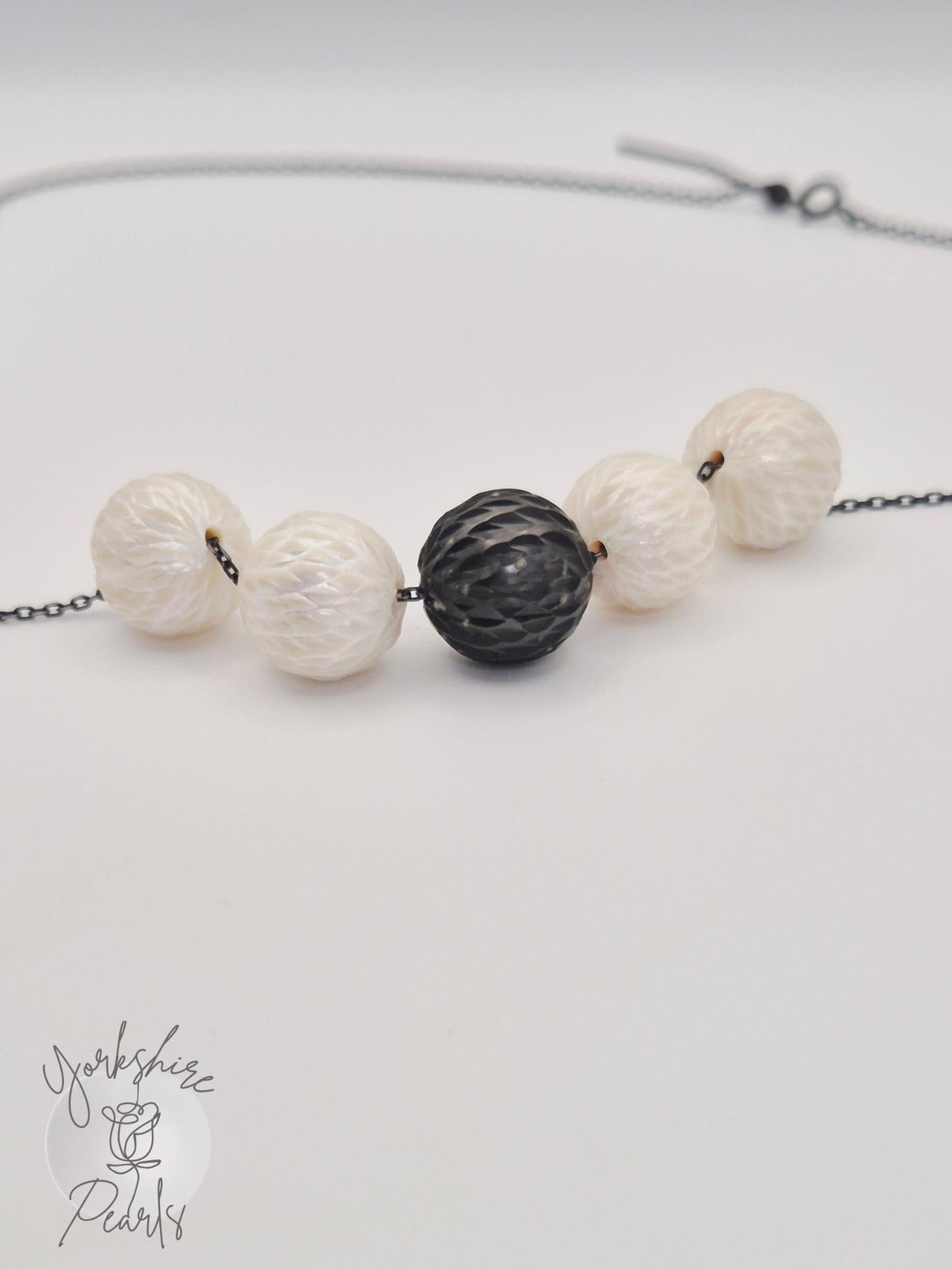 Black Tahitian and White Carved Pearl Smile Necklace