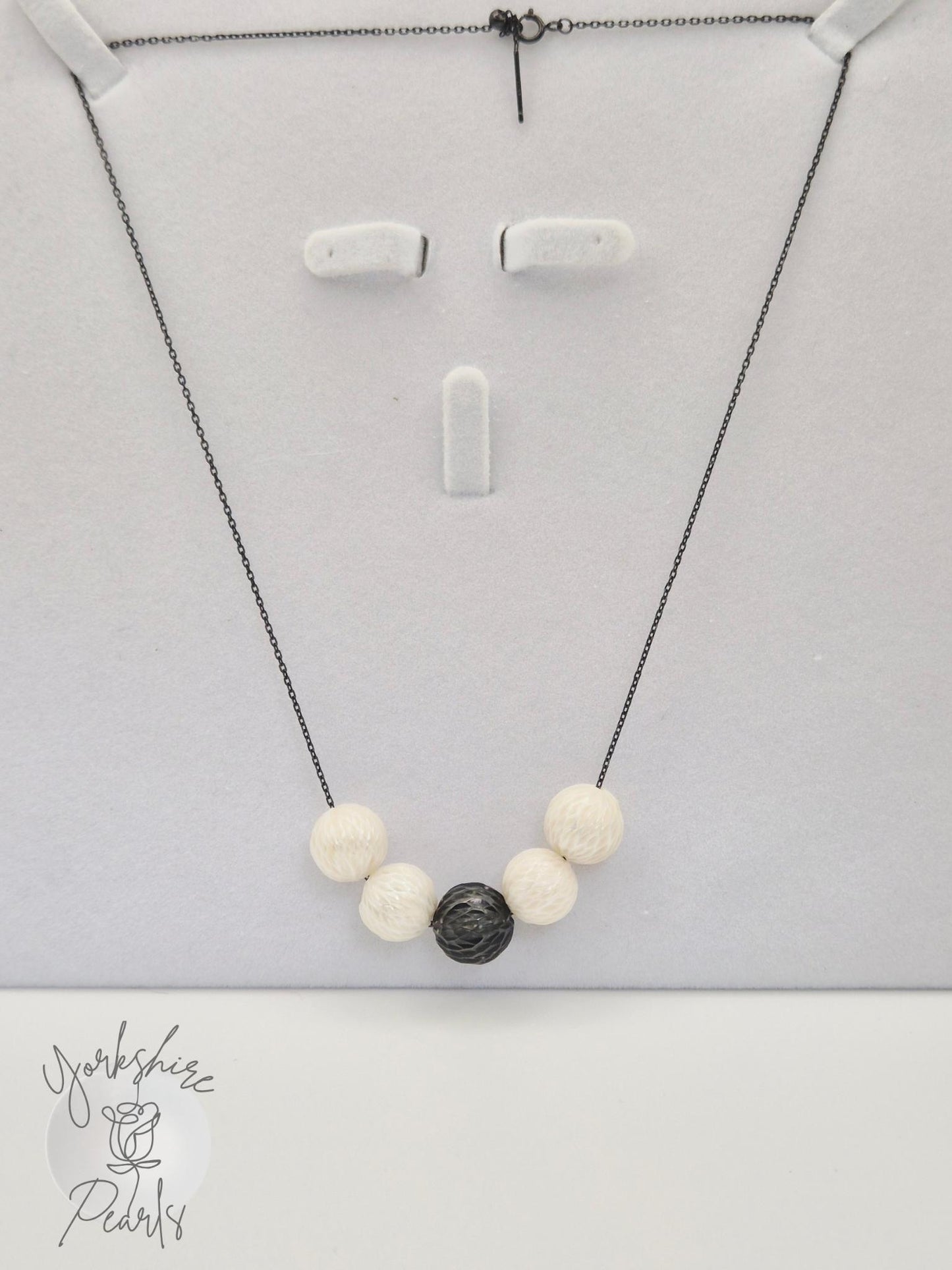 Black Tahitian and White Carved Pearl Smile Necklace