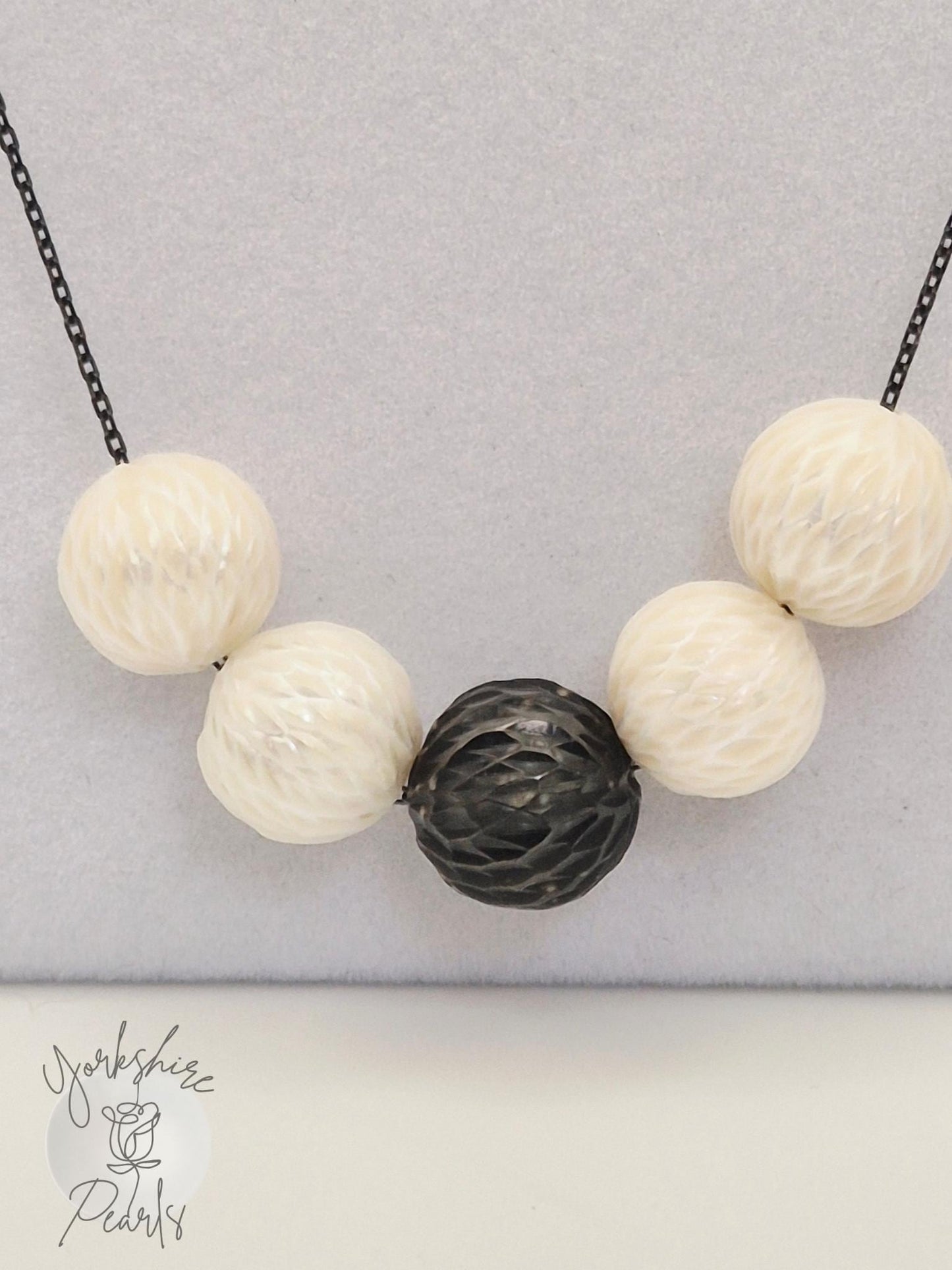 Black Tahitian and White Carved Pearl Smile Necklace