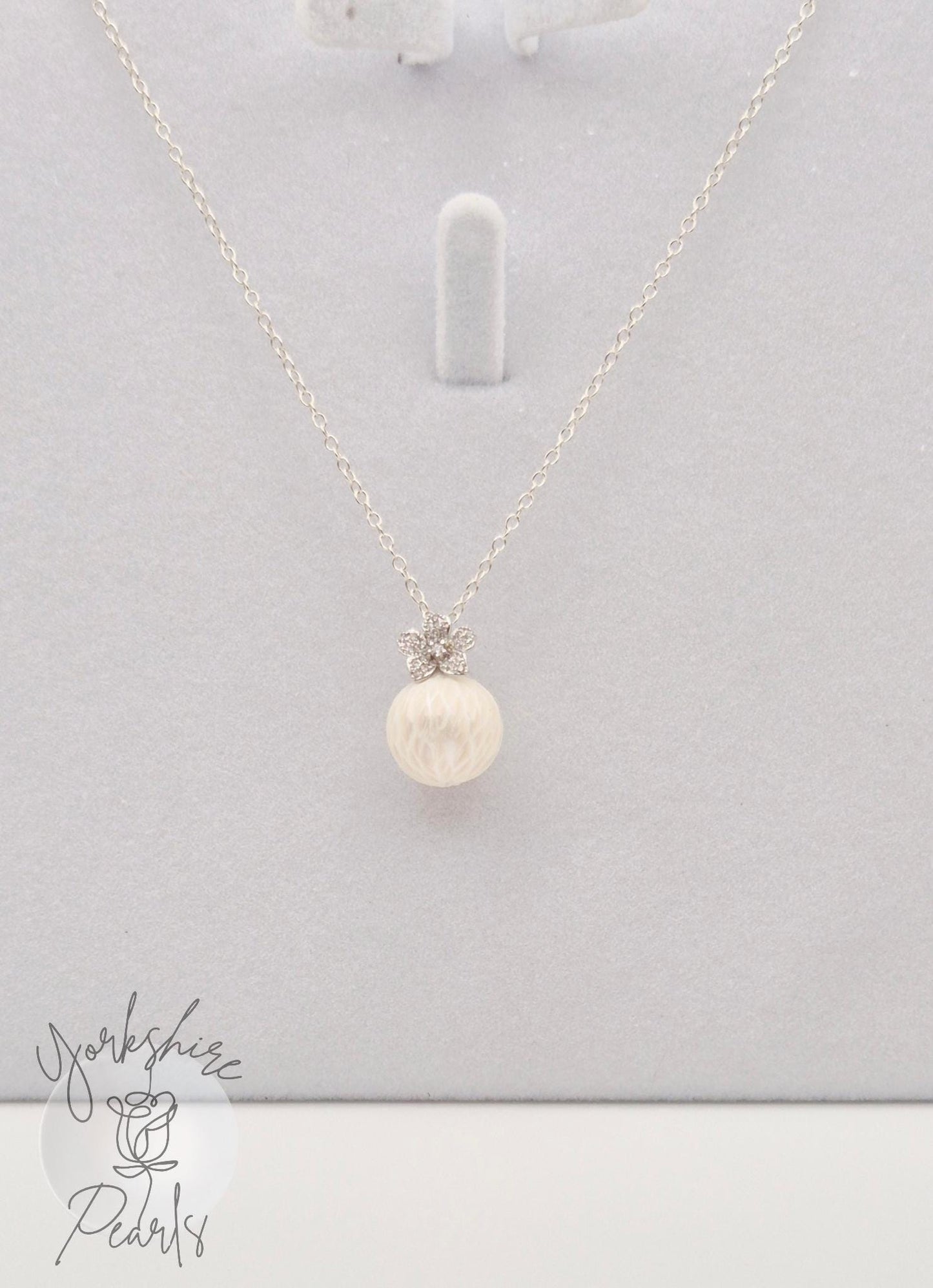 Carved Pearl Minimalist Flower Pendant