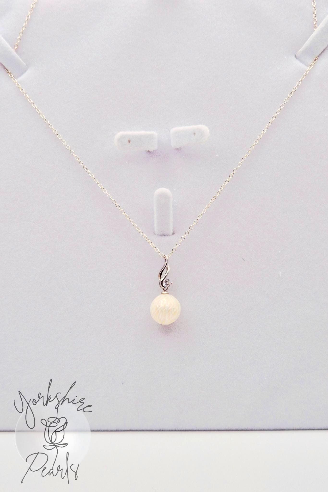 Carved Edison Pearl Minimalist Flame Swirl Pendant