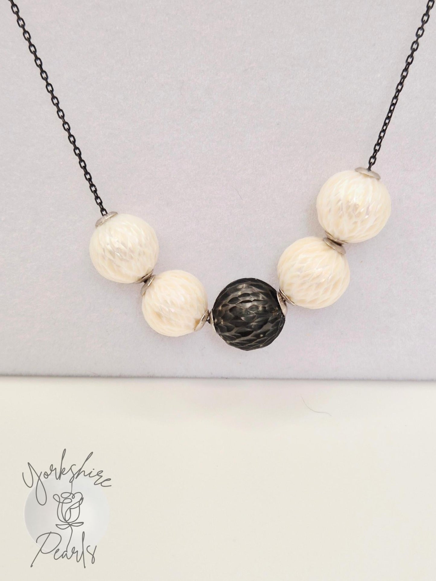 Black Tahitian and White Carved Pearl Smile Necklace