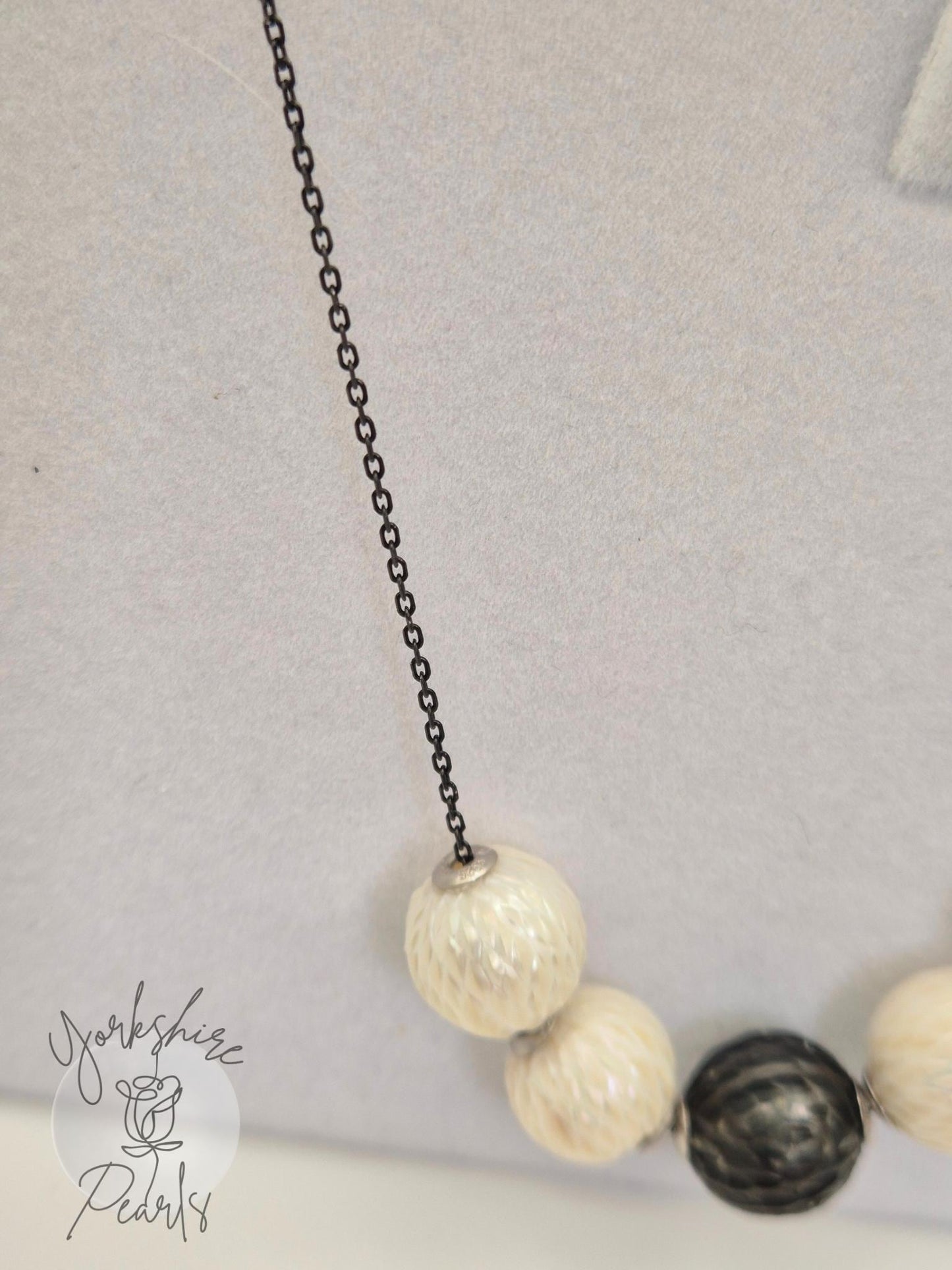 Black Tahitian and White Carved Pearl Smile Necklace