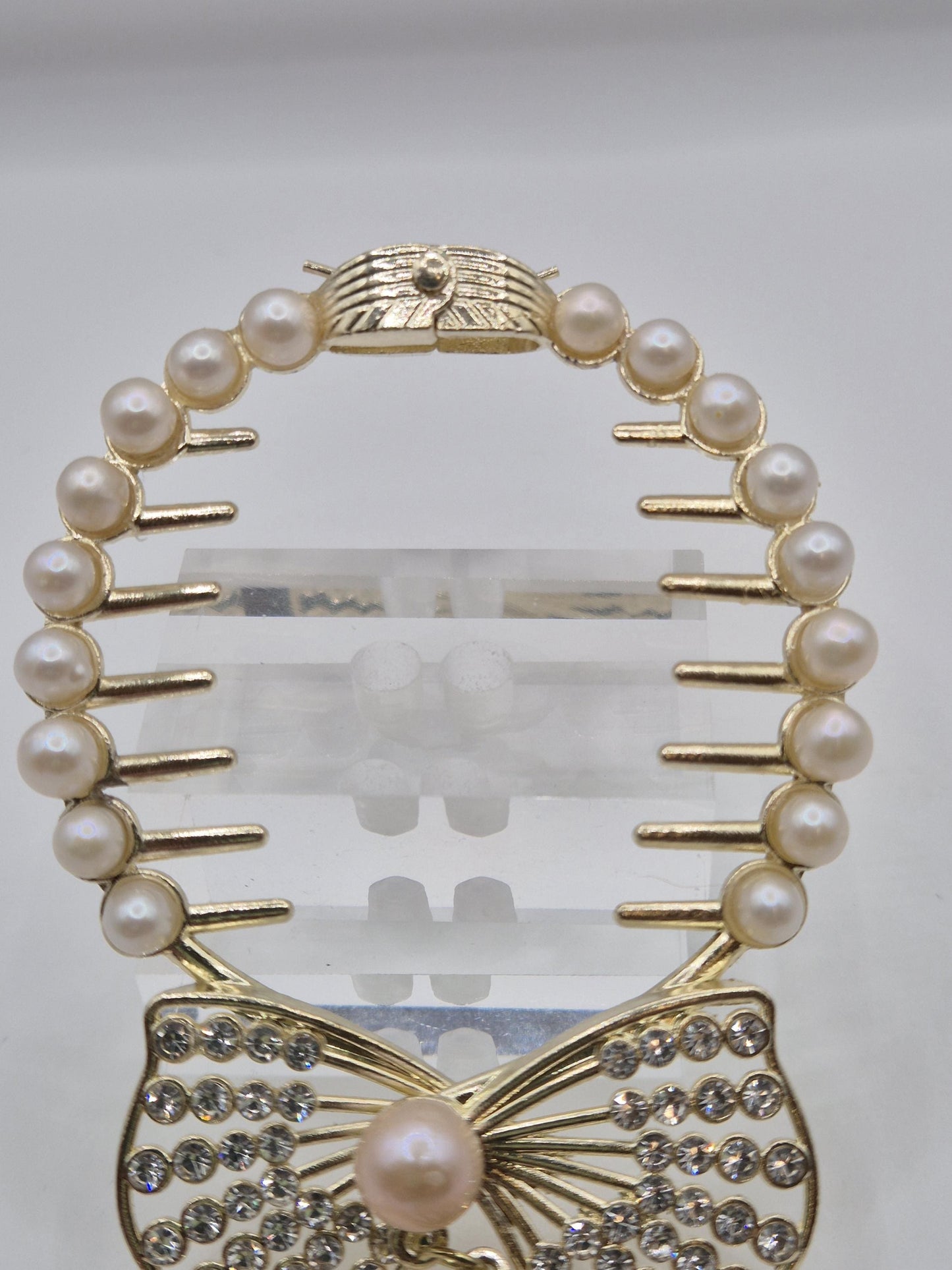 Gilded Bow Pearl Cascade Hair Comb