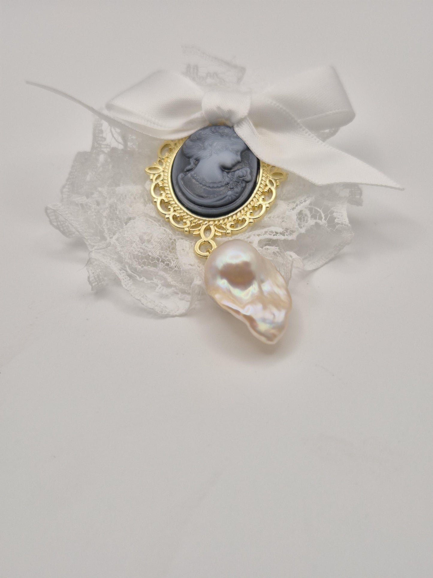 Whimsical King Pearl & White Lace Cameo Brooch