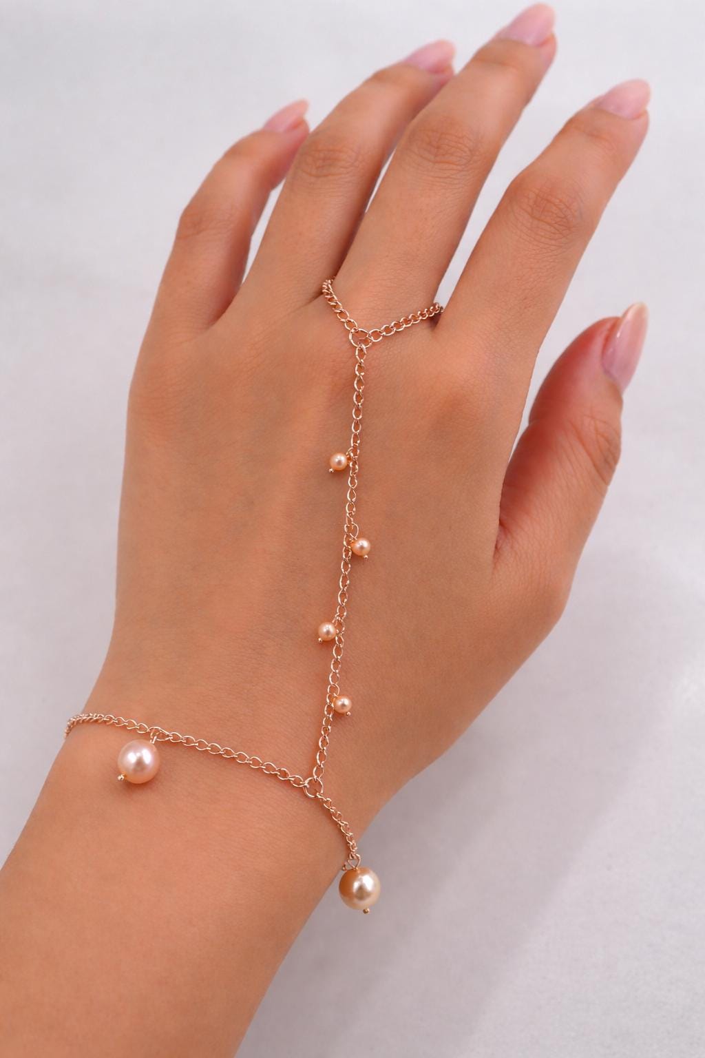 Rose Gold Multiple Pearl Hand & Ring Chain