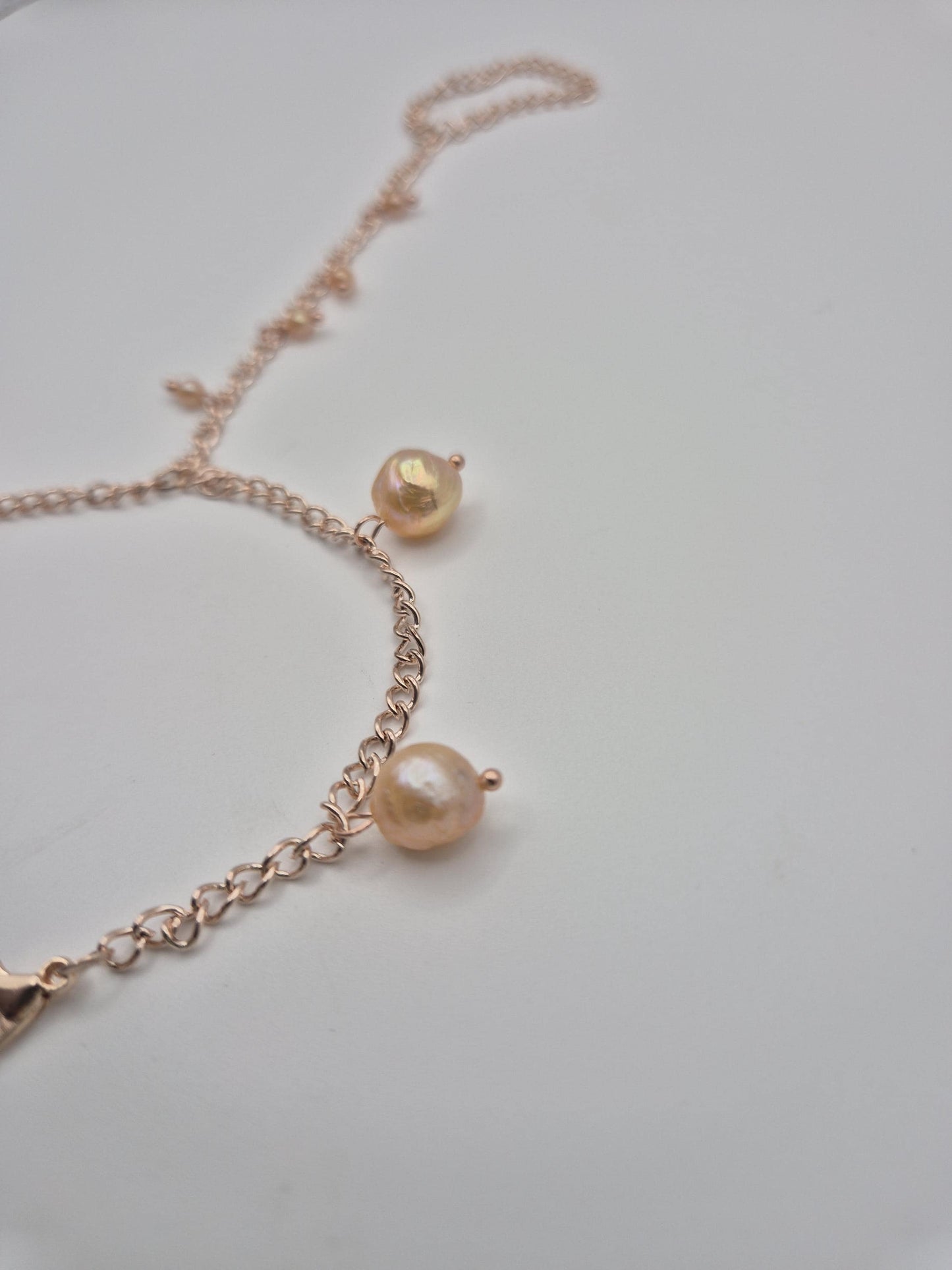 Rose Gold Multiple Pearl Hand & Ring Chain