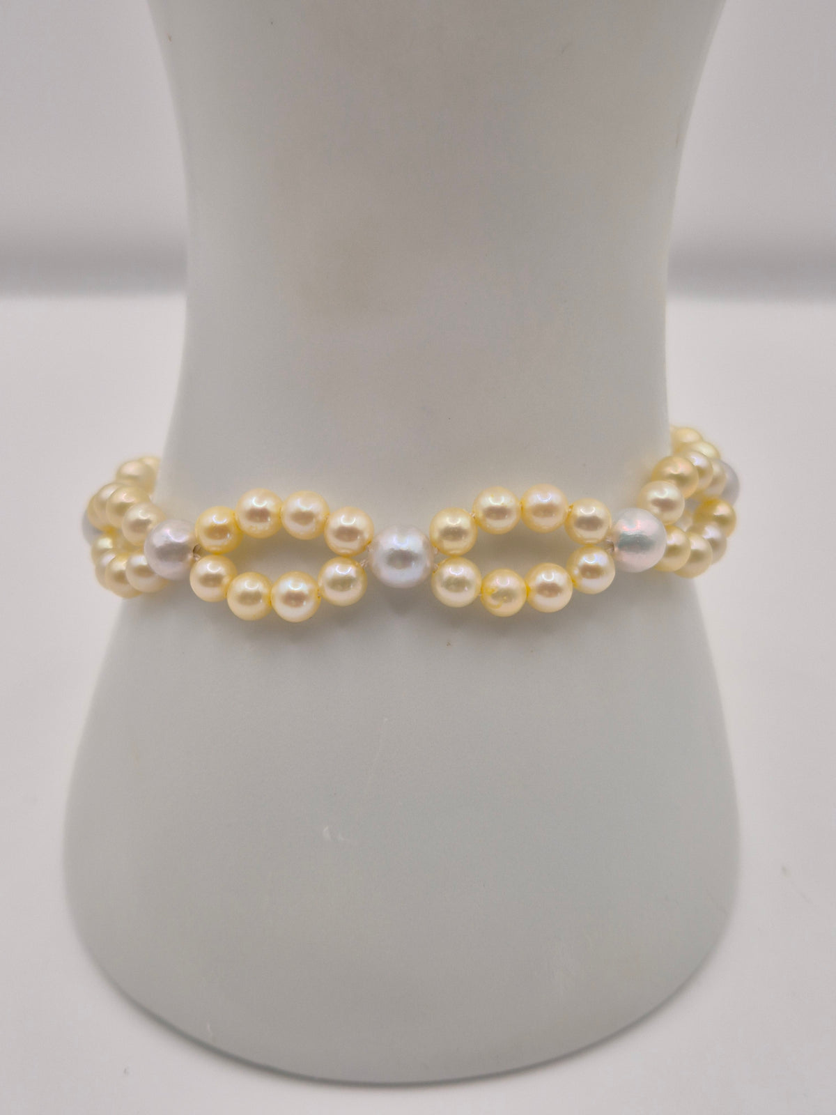 Golden Infinity Pearl Bracelet