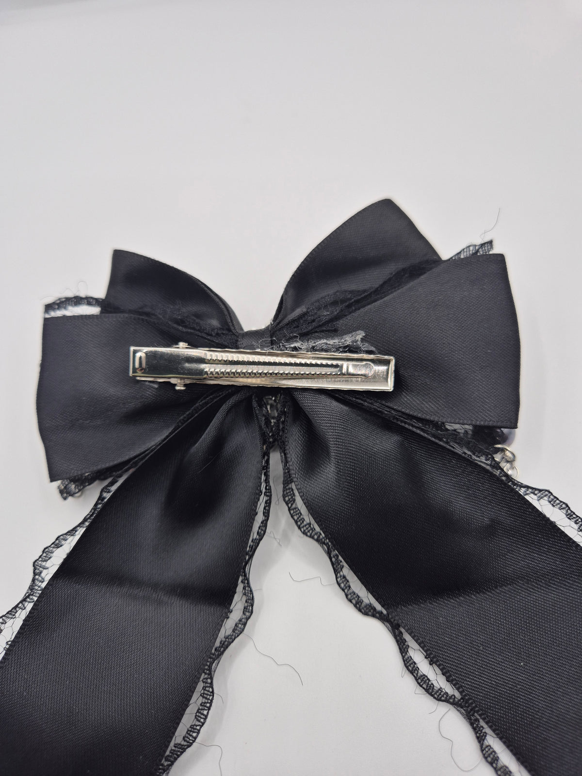 Midnight Devotion Pearl Bow Hairpin