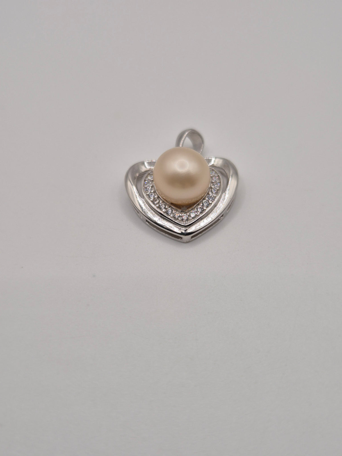 Loves Embrace Pearl Pendant