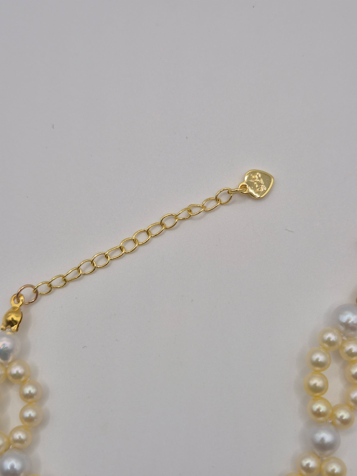 Golden Infinity Pearl Bracelet
